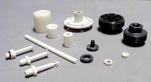 Assortment of molded plastic stems, floats, nuts, collars and tank fittings for liquid level sensors